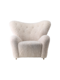 Fauteuil de salon en peau de mouton et chêne avec roulettes en laiton pour salon