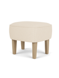 Pouf rembourré en tissu au design compact pour le salon